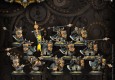 Warmachine: Black Dragons Unit Upgrade Kit Privateer Press bringt einen Aufrüstsatz heraus mit dem die Spieler aus einer Box Iron Fang Pikemen Unit und einem Blister mit dem Offizier und der Standarte eine Einheit Black Dragons samt Angliederung bauen können.