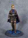 Dark Sword Miniatures Female Mage With Spellbook 1